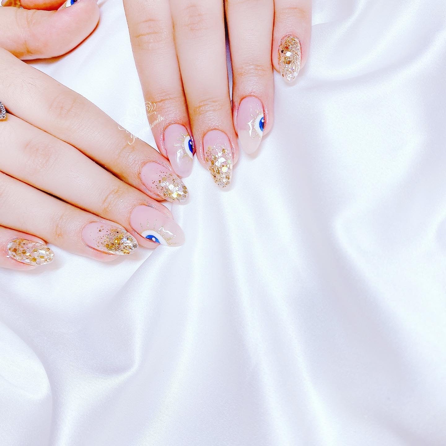 Gold glitter with hand printed evil eye